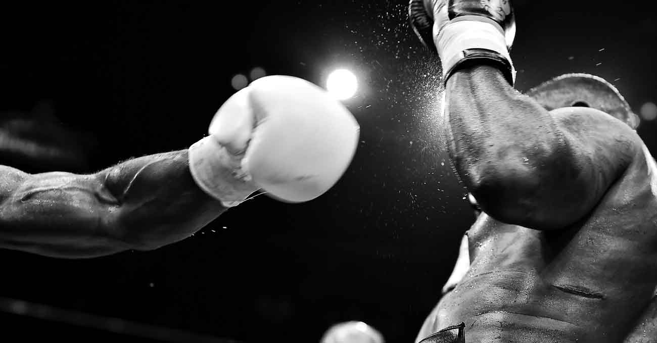 man boxing black and white